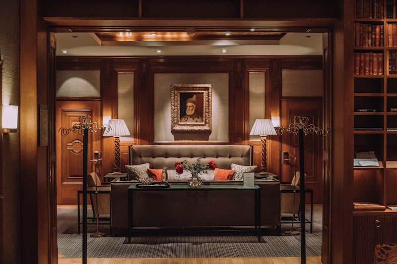 Hotel lounge with city view at dusk